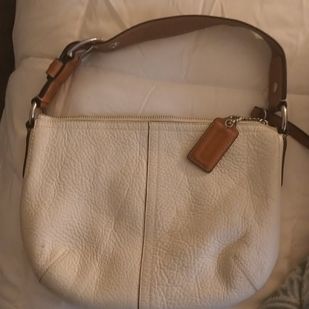 White coach refined pebbled off white